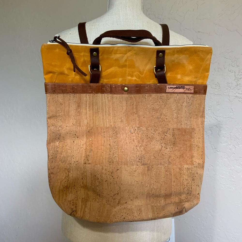 Women’s mustard waxed canvas and cork fabric convertible backpack
